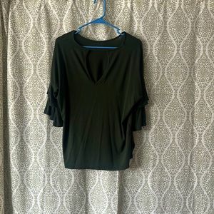 I am selling this dark green blouse.